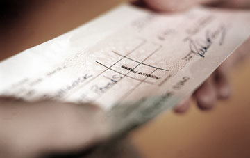 insurance cheques should be held onto until work is complete